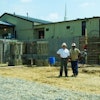 Tim Parrish, left, president of Cornerstone Foundations, and TC Curry, right, a project manager with the company, on site at a building addition project at a Virginia church.
