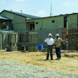 Tim Parrish, left, president of Cornerstone Foundations, and TC Curry, right, a project manager with the company, on site at a building addition project at a Virginia church.