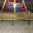 Decorative concrete mimics a wood boardwalk at iPlay America indoor theme park in New Jersey.