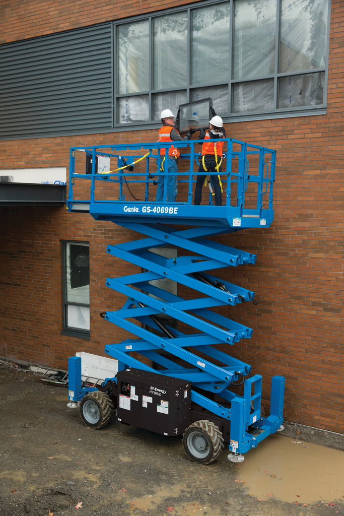 The Genie GS-4069 hybrid scissor lift keeps itself charged and can supply full AC power when onsite power is not available. It can also switch to hybrid or electric to meet rough-terrain or indoor slab environments.
