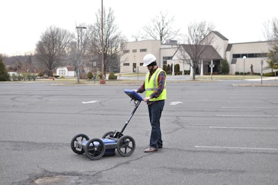 US Radar Q5 by manhole in parking lot 55d63e3d9ca3e