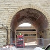 Western's work included demo of all concrete patching on the brick archways, removal and replacement of all damaged bricks, and tuckpointing of all deteriorated mortar joints.