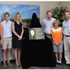 From left to right: NCAT Assistant Director/Test Track Manager Buzz Powell, Garrison Brock, Carolyn Brock, Ben Brock, Pierce Brock, NCAT Director Randy West, NCAT Director Emeritus Ray Brown.