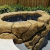 The rock waterfall pictured here was created using a concrete squeeze pump, which was the ideal solution for Pool Crafters to preserve the detailed process of rock carving.