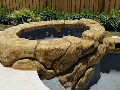 The rock waterfall pictured here was created using a concrete squeeze pump, which was the ideal solution for Pool Crafters to preserve the detailed process of rock carving.