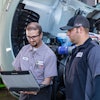 Central Oregon Truck Co. has realized the benefits of Kenworth TruckTech+. Justin MacDonald (left), a service technician with Papé Kenworth, is shown with Travis Seeger, Central Oregon Truck’s maintenance shop foreman, in front of one of the company’s T680s.