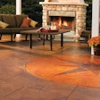 Pictured, an outdoor living space where acid stains were used to etch the concrete surface.