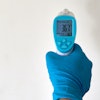 Person Wearing A Rubber Glove 4021186