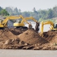 Excavators At Jobsite Freedigitalphotos