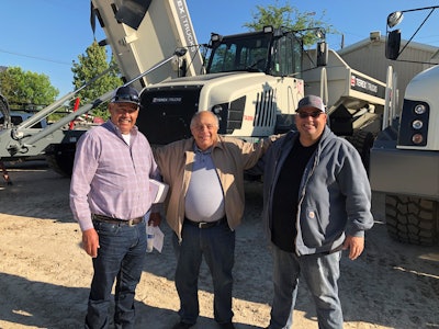 Manuel Franco (left) and Jose Zuniga (right), co-owners of Franco Builders, with Vic Palermo (center), sales representative, Easton Sales & Rentals.