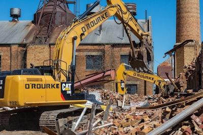 Part of the demolition equipment lineup included five Caterpillar excavators with shears and grapples.