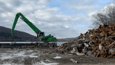A Sennebogen 840 M was used on a power plant project in Ohio, where barge loading operations required a heavier machine with longer reach.