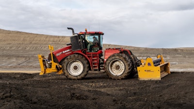 An Earthmoving Support Tractor consisting of a Case tractor power unit with K-Tec Ox Block pusher block on the front and Tricerabox box blade on the rear (such as shown) was used as support on the site.