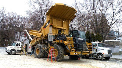 The large tires found on off-highway haul trucks are not cheap to repair or replace after damage occurs. Adding a tailgate can reduce that expense and downtime.