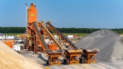 Specifications for the Washington Dulles Airport project (Runway 1C-19C) required a 30-minute limit from time-of-batch to the time-of-placement. Having a second RexCon Model S plant allowed Atlantic Contracting to keep the mix production as close to the paver as possible.