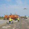 Atlantic Contracting and Material Co. Inc. were hired to pave both the Dulles International and Andrews Airforce Base at the same time. Causing them to purchase a fourth RexCon Model S concrete plant. They used a Guntert & Zimmerman S850 Quadra Bolster Concrete Slipform Paver.
