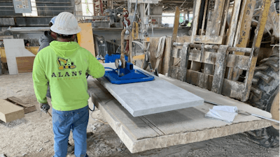 Silverdale Quality Stone coupled a Vacuworx PHD vertical lift mounting assembly with a Caterpillar 262D skid steer loader, using the system to maneuver 1,500-lb limestone slabs in the vertical position