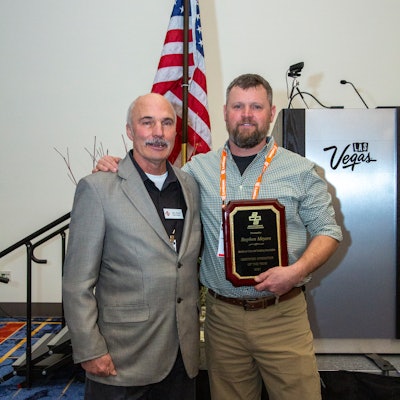 Steve Meyers (right) receives the ACPA Safe Operator of the Year Award from ACPA board president, Gary Brown (left).