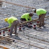 Associated General Contractors reports the average construction worker hourly wage in May rose faster than it has in 40 years, and employment went up by 36,000 workers.