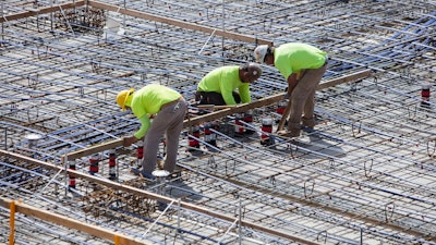 Associated General Contractors reports the average construction worker hourly wage in May rose faster than it has in 40 years, and employment went up by 36,000 workers.