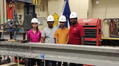 University of Alabama – Team B won the 2022 Big Beam competition. From left to right are Monica Amaral, Bipul Poudel, Revanth Naidu Vasireddy, and faculty advisor Sriram Aaleti.