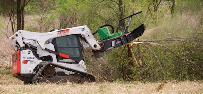 Featuring a 60-in. cutting width, this attachment slices through trees and brush up to 14 in. in diameter, shreds material up to 6 in. in diameter and attaches to most skid steers and compact track loaders.
