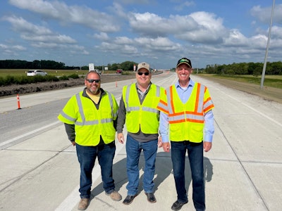 Dennis Howard at the North Dakota concrete paving site with Northern Improvement Company's President Greg McCormick and Foreman Ryan Ziegler.