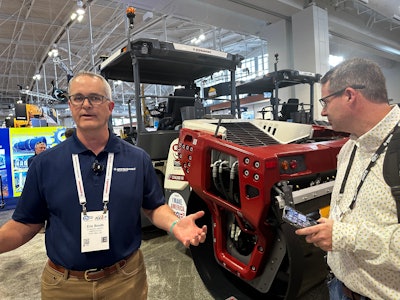 At the Dynapac booth, Eric Booth, the products manager for compaction, gave a short presentation about the new SEISMIC for asphalt feature that now comes standard on the models 2200 - 6200.