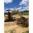 Designed for work in tight spaces, the machine is powered by a 23.6-hp Kubota engine and comes equipped with an 18-in. bucket.