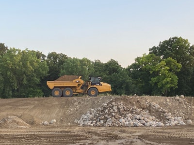 A 740 GC articulated dump truck during the demo, loaded using payload indication