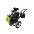 Powered by a 27-hp electric start gasoline engine, the machine features a single piece drum design with cutouts on each side of the housing for access.