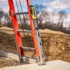 The LevelSafe Pro automatically adjusts the ladder to a level position upon placement.