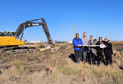 Western Global team members participate in the new facility groundbreaking in October 2023.