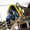 A construction worker’s feet are at risk of injury from things like falling objects, slippery surfaces, uneven surfaces, or sharp objects lying around.