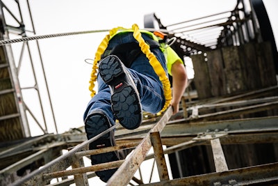 A construction worker’s feet are at risk of injury from things like falling objects, slippery surfaces, uneven surfaces, or sharp objects lying around.