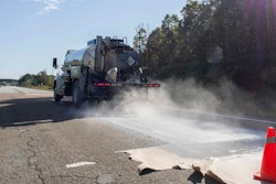 A truck applies Delta Mist being to the NCAT test track. The treated pavement continued to outperform the control surface even 48 months after the initial application.