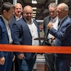 Toyota Material Handling held a ribbon-cutting ceremony for the company’s AutoStore installation within its Parts Distribution Center in Columbus, Indiana. Pictured (Front L-R): Bastian Solutions Chairman Hito Matsuoka, AutoStore Director of Sales - North America Joe Elie, and Toyota Material Handling North America President & CEO Brett Wood (Back L-R): Toyota Material Handling Vice President of Aftermarket Operations Bret Bruin and Toyota Material Handling President & CEO Bill Finerty.