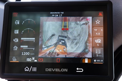 DEVELON's Transparent Bucket feeds video images captured by cameras outside the vehicle onto a display inside the cab. The images converge on screen to project a “ghosted,” real-time video of what’s going on beyond the bucket, in front of the machine.