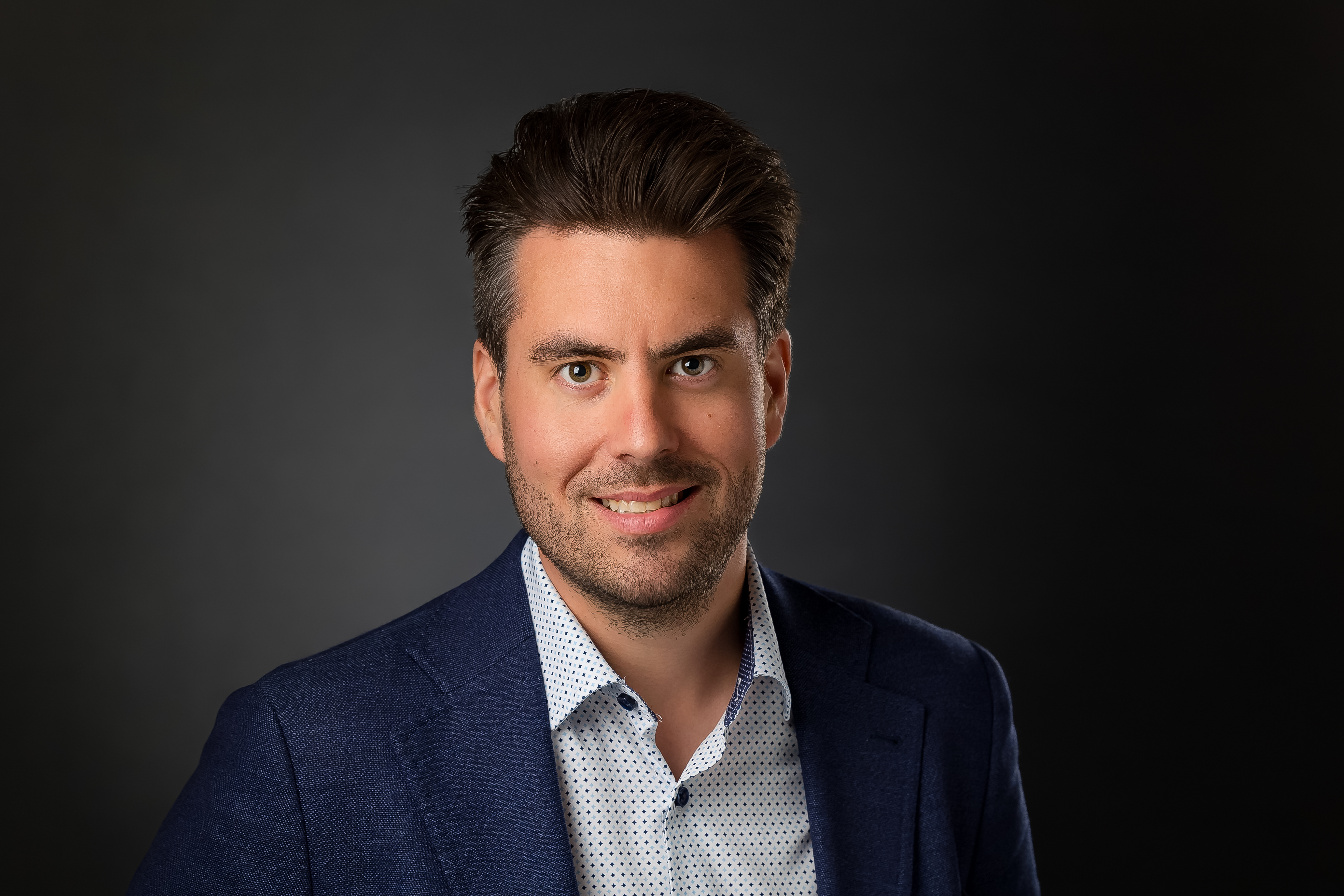 Ryan Rademann, Partner, Wipfli Headshot