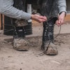 Never treat lace-up work boots like a pull-on boot. Instead, untie and fully loosen the laces when putting work boots on or taking them off.