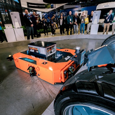 The JLG Autonomous Mobile Charging Robot concept recharging the Galileo at CES 2025.