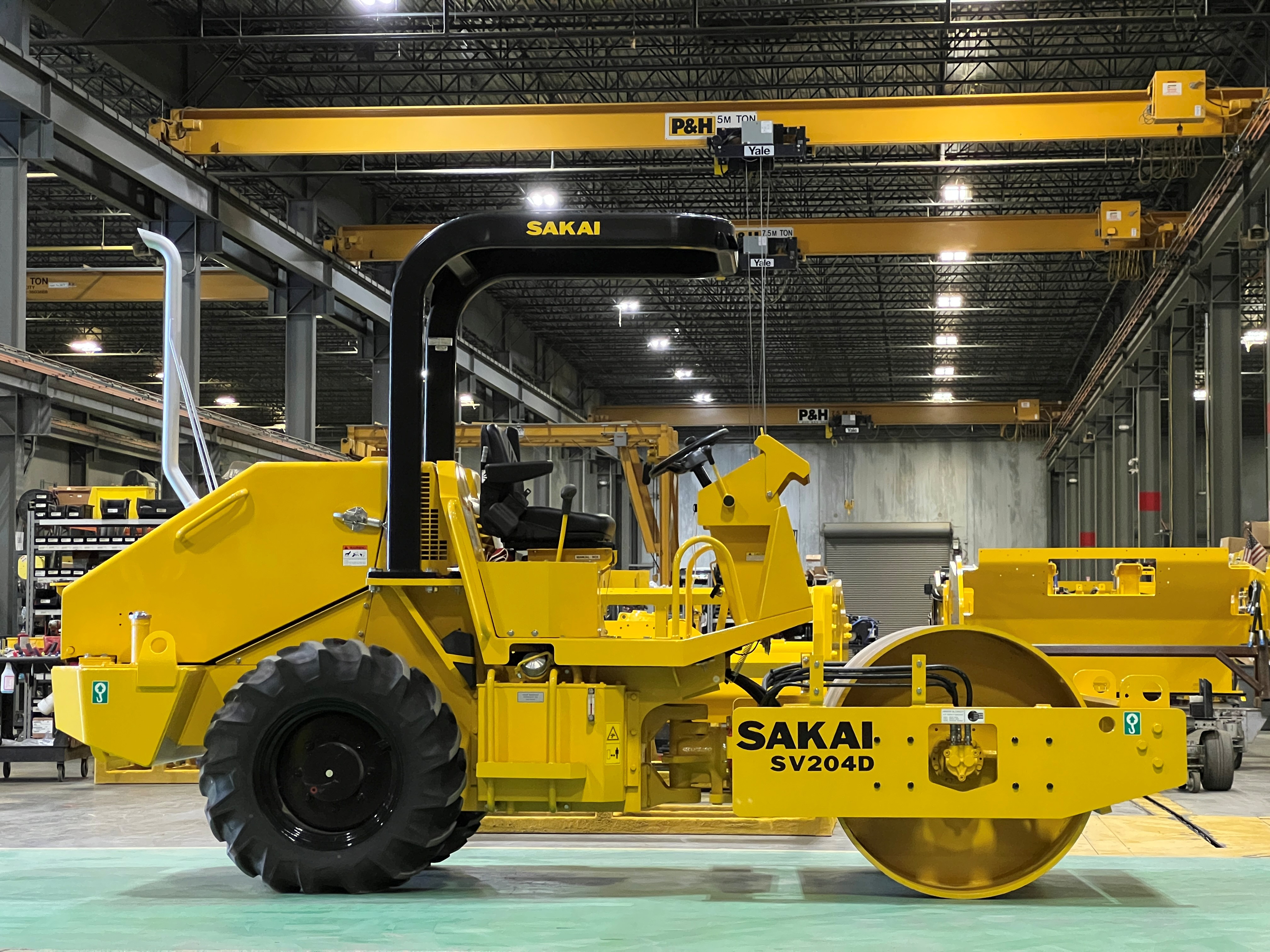 Sakai Sv204 First Us Production Unit In Front Of Ga Assembly Line