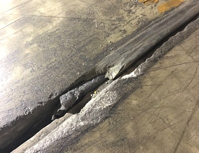 Concrete joint filler improperly filled over a backer rod.