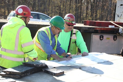 Contractors and material suppliers collaborating on-site to advance circular, sustainable concrete practices.