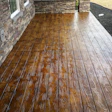 Stamped concrete mimicking natural wood delivers the look of timber with the durability of concrete.
