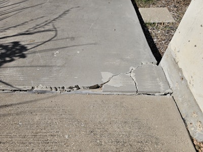 Example of concrete capping failure resulting in delamination.