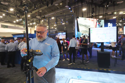 Paul Carlson, RDO Equipment Co.’s product manager for construction software, demonstrates high-accuracy survey solutions from Topcon Positioning Systems.