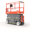 Red and gray Skyjack scissor lift aerial work platform with extended platform and safety railings