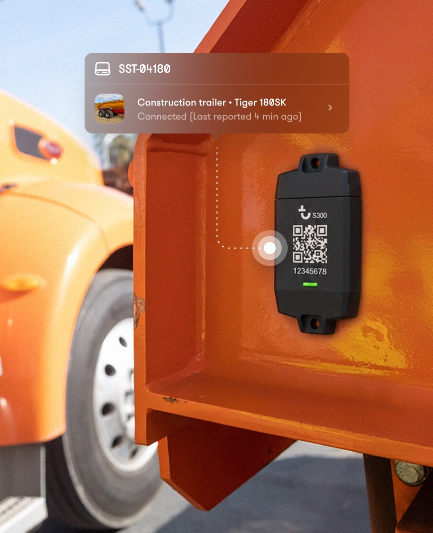S300 GPS tracker device mounted on orange construction trailer with QR code and serial number